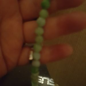 26 inches of different colors of green adventurine